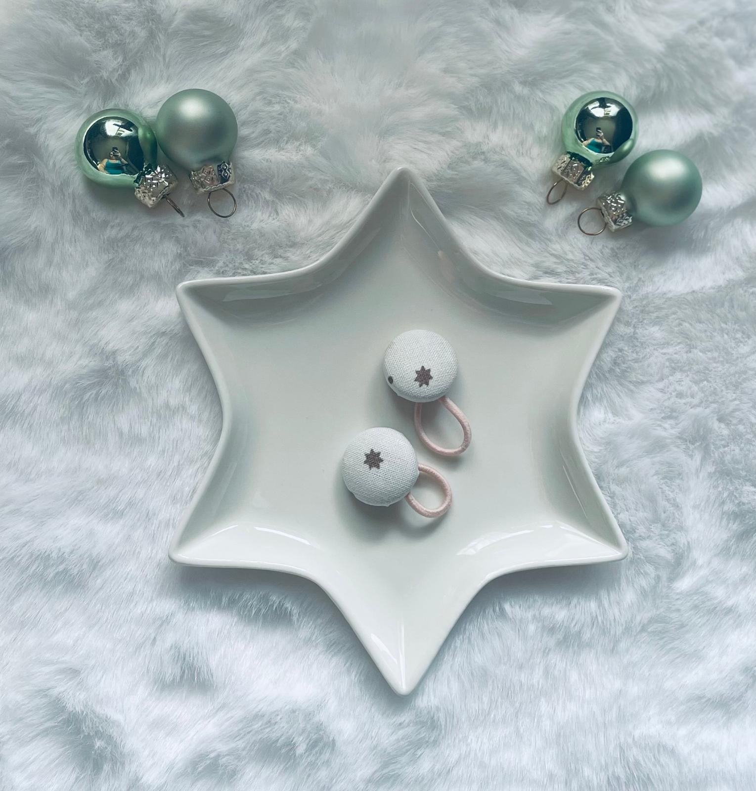 Haarzauber mit Sternenmotiv