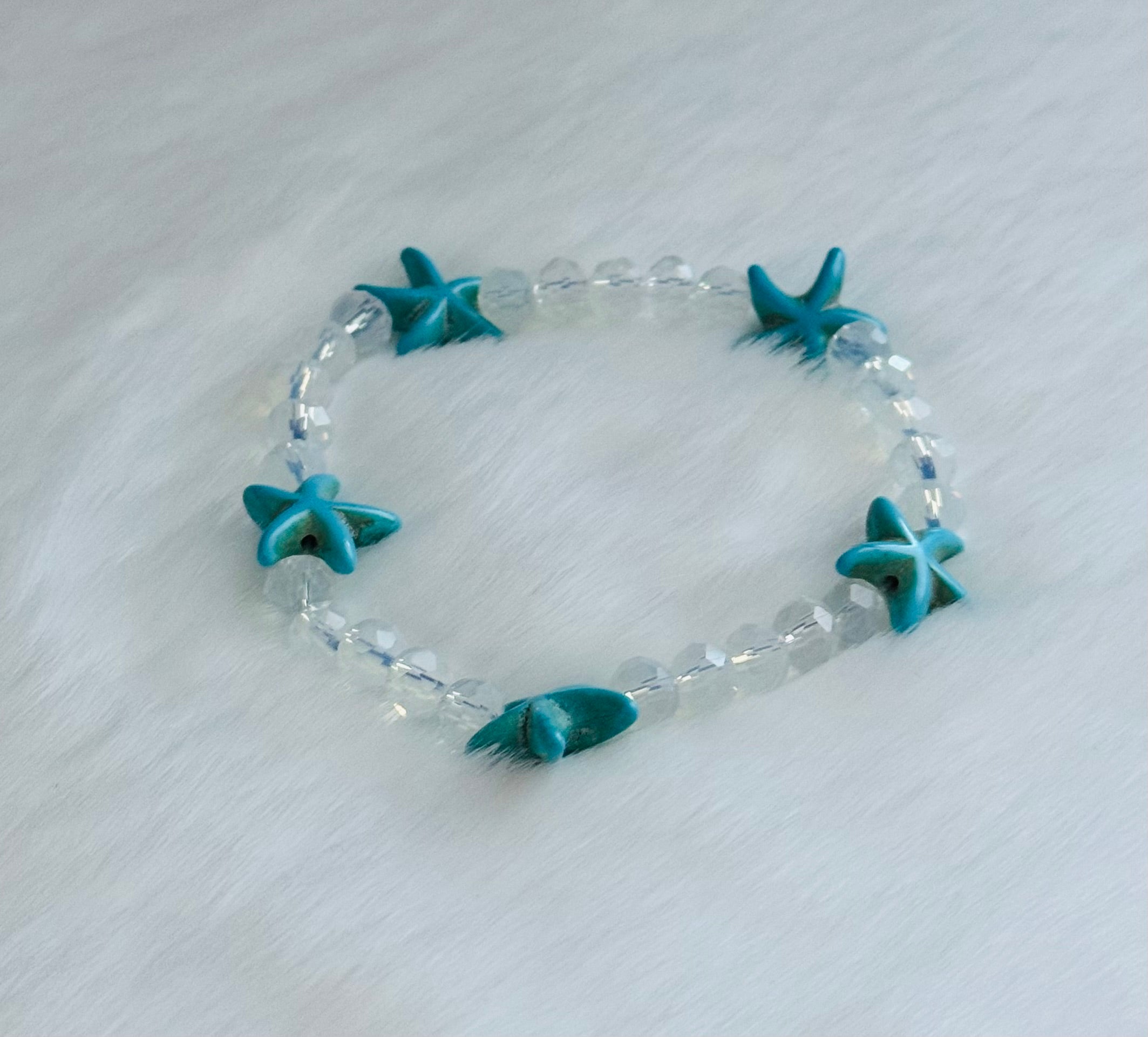 Opalit Armband mit türkisen Seesternen